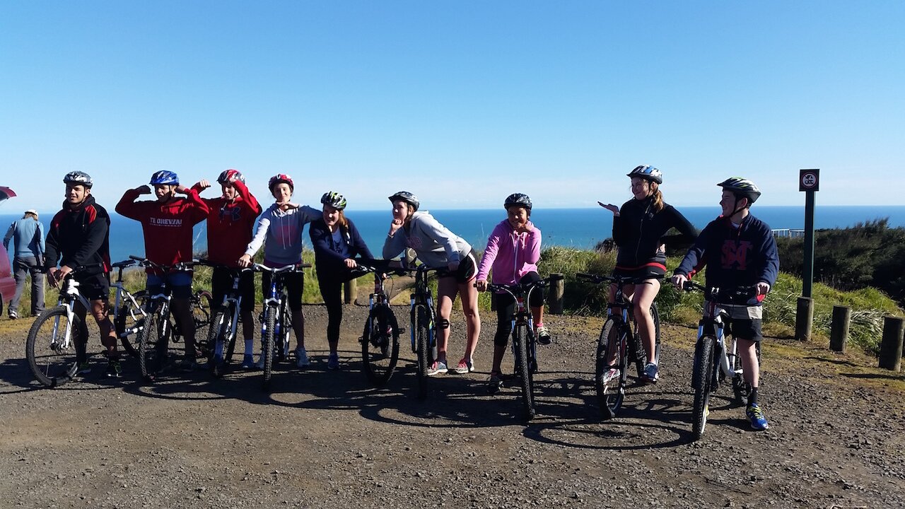 Group Mountain Bikes ride In Raglan
